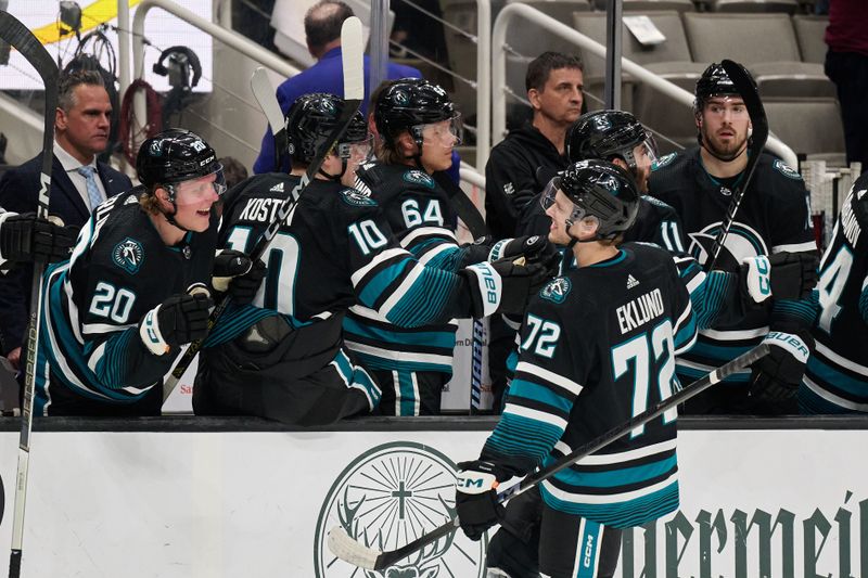 Mar 21, 2024; San Jose, California, USA; San Jose Sharks left wing William Eklund (72) shakes hands with his teammates on the bench after scoring a goal against the Tampa Bay Lightning during the first period at SAP Center at San Jose. Mandatory Credit: Robert Edwards-USA TODAY Sports