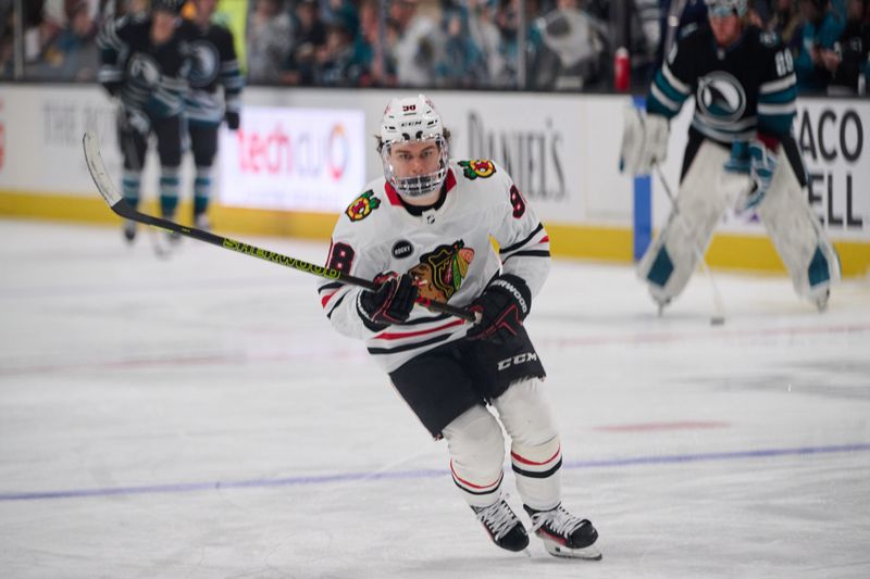 Mar 23, 2024; San Jose, California, USA; Chicago Blackhawks center Connor Bedard (98) warms up before the game between the San Jose Sharks and the Chicago Blackhawks at SAP Center at San Jose. Mandatory Credit: Robert Edwards-USA TODAY Sports