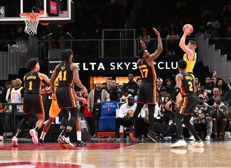 ATLANTA, GEORGIA - JANUARY 12:  T.J. McConnell #9 of the Indiana Pacers shoots the ball during the game against the Atlanta Hawks on January 12, 2024 at State Farm Arena in Atlanta, Georgia. NOTE TO USER: User expressly acknowledges and agrees that, by downloading and or using this photograph, User is consenting to the terms and conditions of the Getty Images License Agreement. (Photo by Paras Griffin/Getty Images)