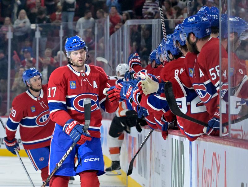 Sep 23, 2024; Montreal, Quebec, CAN; Montreal Canadiens forward Josh Anderson (17) celebrates with teammates after scoring a goal against the Philadelphia Flyers during the third period at the Bell Centre. Mandatory Credit: Eric Bolte-Imagn Images