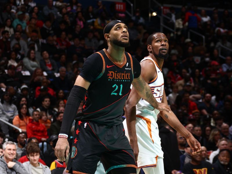 WASHINGTON, DC -? FEBRUARY 4: Daniel Gafford #21 of the Washington Wizards and Kevin Durant #35 of the Phoenix Suns look on during the game on February 4, 2024 at Capital One Arena in Washington, DC. NOTE TO USER: User expressly acknowledges and agrees that, by downloading and or using this Photograph, user is consenting to the terms and conditions of the Getty Images License Agreement. Mandatory Copyright Notice: Copyright 2024 NBAE (Photo by Kenny Giarla/NBAE via Getty Images)