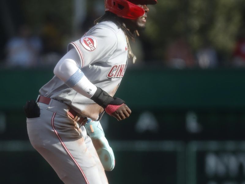 Aug 13, 2023; Pittsburgh, PA, USA; Cincinnati Reds shortstop Elly De La Cruz (44) takes a lead off of second base against the Pittsburgh Pirates during the first inning at PNC Park. Mandatory Credit: Charles LeClaire-USA TODAY Sports