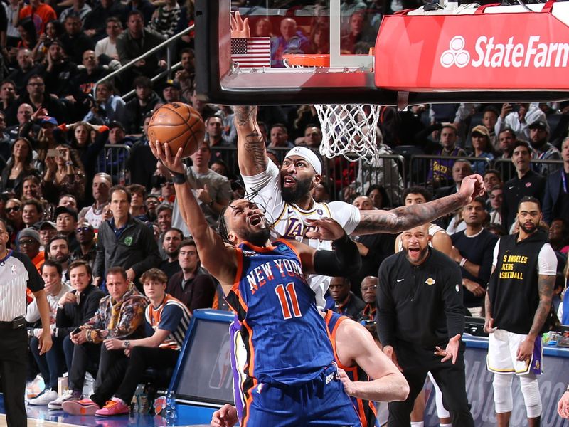 NEW YORK, NY - FEBRUARY 3: Anthony Davis #3 of the Los Angeles Lakers blocks the shot by Jalen Brunson #11 of the New York Knicks during the game on February 3, 2024 at Madison Square Garden in New York City, New York.  NOTE TO USER: User expressly acknowledges and agrees that, by downloading and or using this photograph, User is consenting to the terms and conditions of the Getty Images License Agreement. Mandatory Copyright Notice: Copyright 2024 NBAE  (Photo by Nathaniel S. Butler/NBAE via Getty Images)