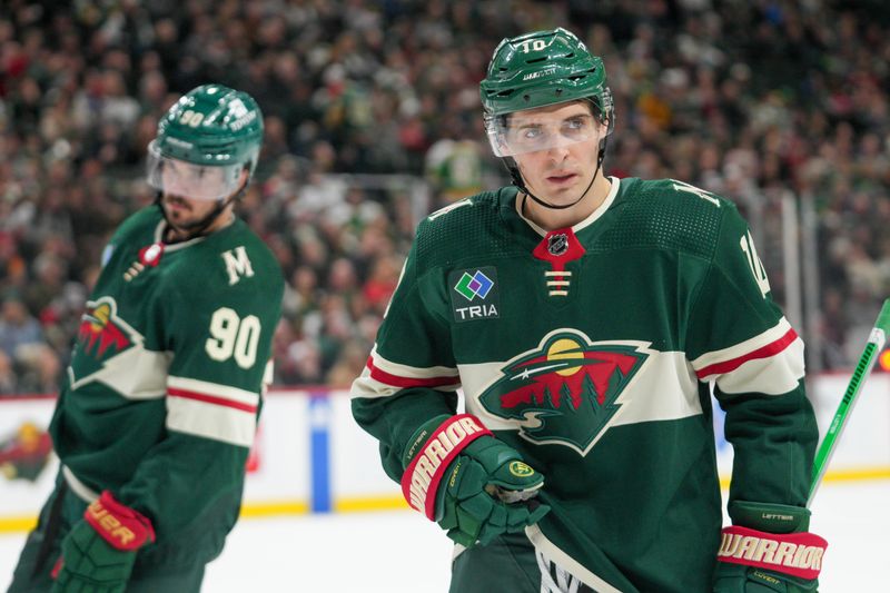 Feb 19, 2024; Saint Paul, Minnesota, USA; Minnesota Wild center Vinni Lettieri (10) during a break against the Vancouver Canucks in the second period at Xcel Energy Center. Mandatory Credit: Matt Blewett-USA TODAY Sports