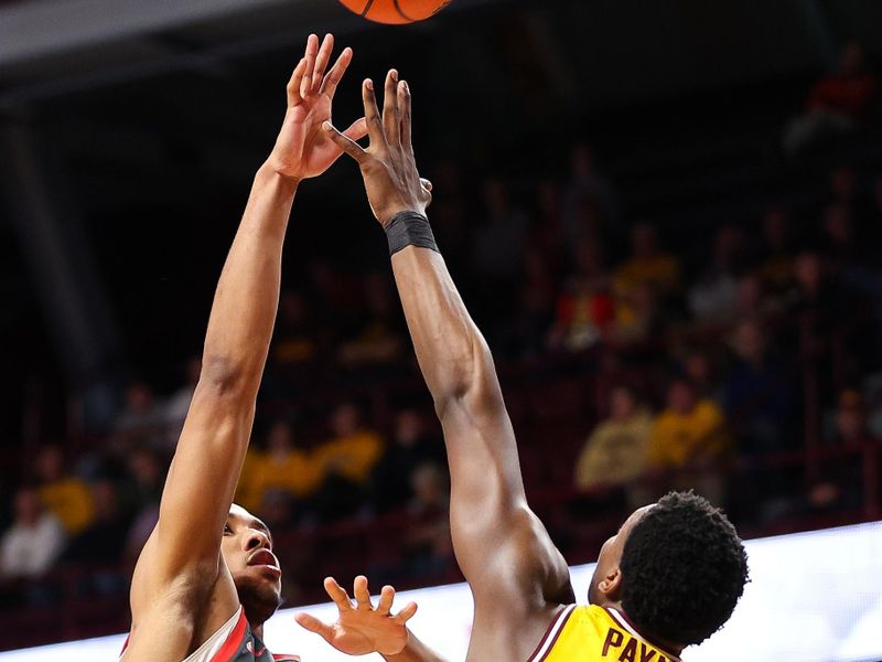 Feb 22, 2024; Minneapolis, Minnesota, USA; Ohio State Buckeyes forward Zed Key (23) shoots as Minnesota Golden Gophers forward Pharrel Payne (21) defends during the second half at Williams Arena. Mandatory Credit: Matt Krohn-USA TODAY Sports