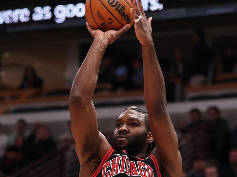 CHICAGO, ILLINOIS - JANUARY 27: Patrick Williams #44 of the Chicago Bulls shoots a three pointer against the Denver Nuggets during the second half at the United Center on January 27, 2025 in Chicago, Illinois. NOTE TO USER: User expressly acknowledges and agrees that, by downloading and or using this photograph, User is consenting to the terms and conditions of the Getty Images License Agreement.  (Photo by Michael Reaves/Getty Images)