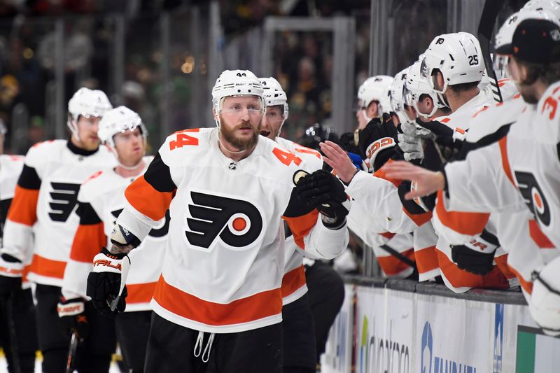 Mar 16, 2024; Boston, Massachusetts, USA; Philadelphia Flyers left wing Nicolas Deslauriers (44) is congratulated by his teammates after scoring a goal during the third period against the Boston Bruins at TD Garden. Mandatory Credit: Bob DeChiara-USA TODAY Sports