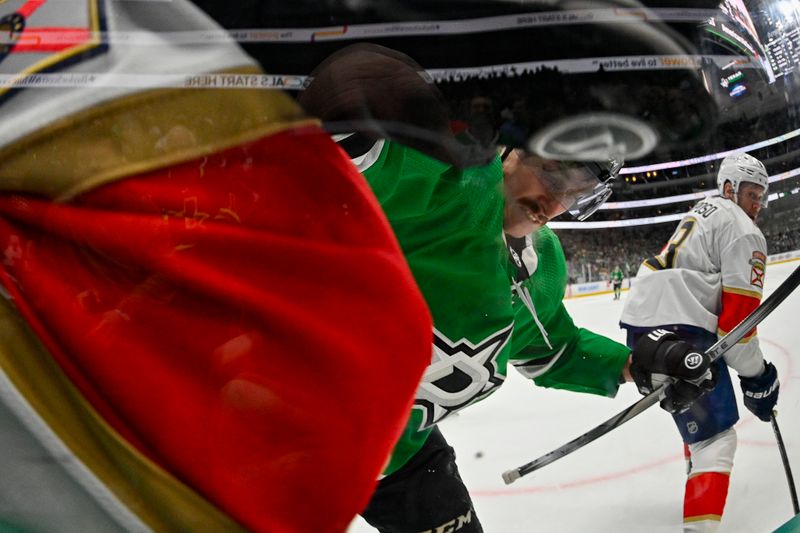 Mar 12, 2024; Dallas, Texas, USA; Dallas Stars left wing Mason Marchment (27) looks for the puck in the Florida Panthers zone during the game at the American Airlines Center. Mandatory Credit: Jerome Miron-USA TODAY Sports