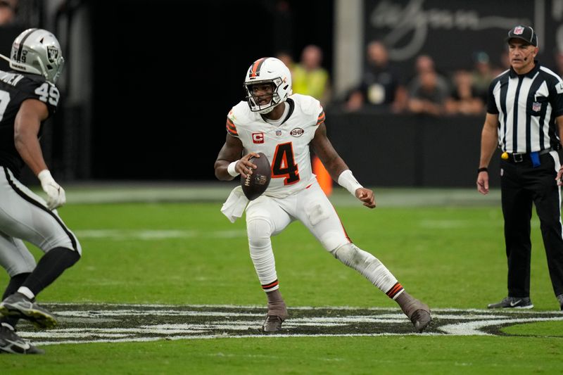 Cleveland Browns quarterback Deshaun Watson scrambles during the first half of an NFL football game against the Las Vegas Raiders Sunday, Sept. 29, 2024, in Las Vegas. (AP Photo/John Locher)