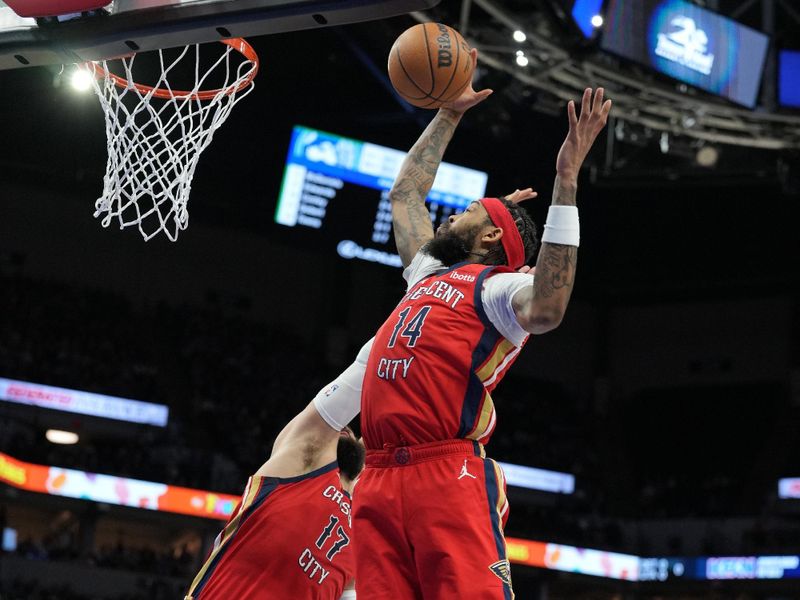 MINNEAPOLIS, MN -  JANUARY 3:  Brandon Ingram #14 of the New Orleans Pelicans grabs a rebound during the game against the Minnesota Timberwolves on January 3, 2024 at Target Center in Minneapolis, Minnesota. NOTE TO USER: User expressly acknowledges and agrees that, by downloading and or using this Photograph, user is consenting to the terms and conditions of the Getty Images License Agreement. Mandatory Copyright Notice: Copyright 2024 NBAE (Photo by Jordan Johnson/NBAE via Getty Images)