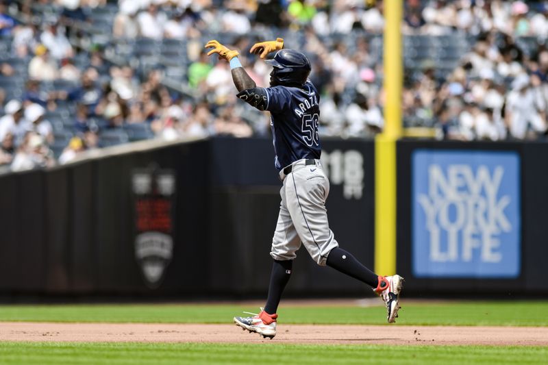 Jul 21, 2024; Bronx, New York, USA; Tampa Bay Rays outfielder Randy Arozarena (56) reacts after hitting a solo home run against the New York Yankees during the fourth inning at Yankee Stadium. Mandatory Credit: John Jones-USA TODAY Sports