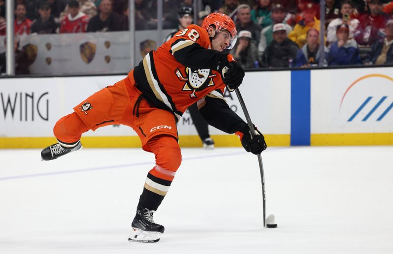 Mar 11, 2025; Anaheim, California, USA; Anaheim Ducks center Jansen Harkins (38) shoots during the second period against the Washington Capitals at Honda Center. Mandatory Credit: Jason Parkhurst-Imagn Images