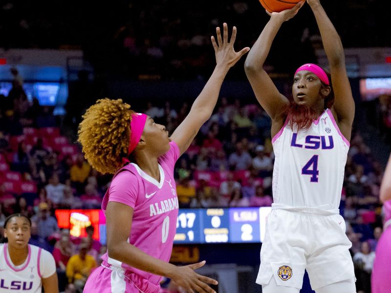 Feb 11, 2024; Baton Rouge, Louisiana, USA; LSU Lady Tigers guard Flau'jae Johnson (4) shoots against Alabama Crimson Tide guard Loyal McQueen (0) during the first half at Pete Maravich Assembly Center. Mandatory Credit: Matthew Hinton-USA TODAY Sports