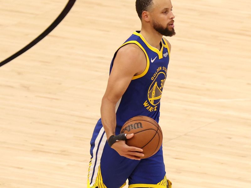 HOUSTON, TEXAS - APRIL 23: Stephen Curry #30 of the Golden State Warriors dribbles the ball against the Houston Rockets during the fourth quarter in Game Two of the Western Conference First Round NBA Playoffs at Toyota Center on April 23, 2025 in Houston, Texas. NOTE TO USER: User expressly acknowledges and agrees that, by downloading and or using this photograph, User is consenting to the terms and conditions of the Getty Images License Agreement. (Photo by Kenneth Richmond/Getty Images)