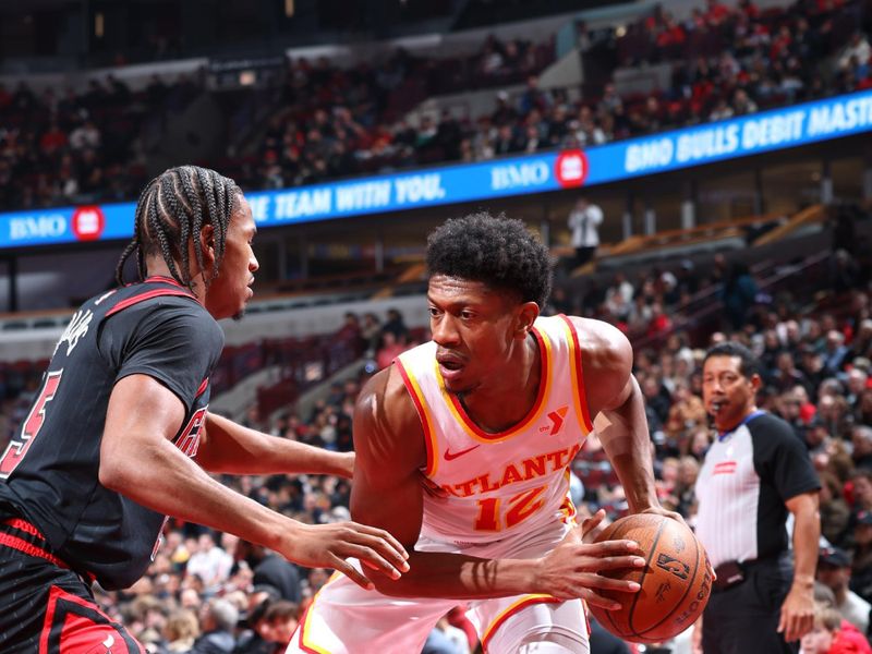 CHICAGO, IL - NOVEMBER 22: De'Andre Hunter #12 of the Atlanta Hawks handles the ball during the game against the Chicago Bulls during the Emirates NBA Cup game on November 22, 2024 at United Center in Chicago, Illinois. NOTE TO USER: User expressly acknowledges and agrees that, by downloading and or using this photograph, User is consenting to the terms and conditions of the Getty Images License Agreement. Mandatory Copyright Notice: Copyright 2024 NBAE (Photo by Jeff Haynes/NBAE via Getty Images)