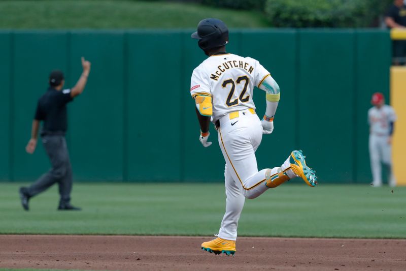 Jul 2, 2024; Pittsburgh, Pennsylvania, USA;  Pittsburgh Pirates designated hitter Andrew McCutchen (22) circles the bases on a solo home run against the St. Louis Cardinals during the fifth inning at PNC Park. Mandatory Credit: Charles LeClaire-USA TODAY Sports