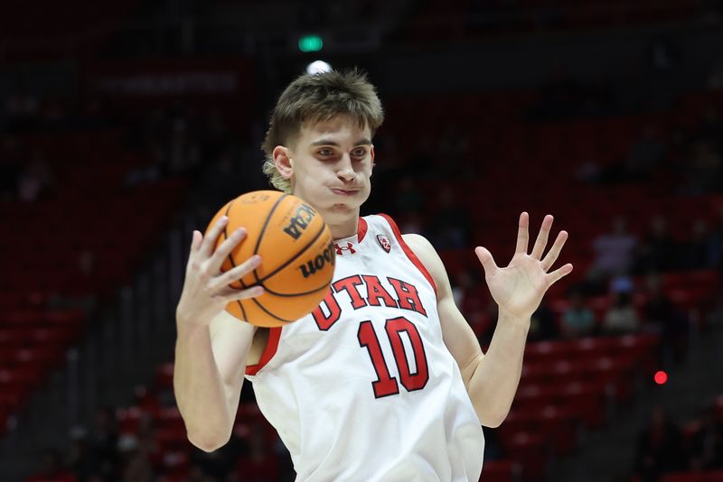 Dec 20, 2023; Salt Lake City, Utah, USA; Utah Utes forward Jake Wahlin (10) rebounds the ball against the Bellarmine Knights during the first half at Jon M. Huntsman Center. Mandatory Credit: Rob Gray-USA TODAY Sports