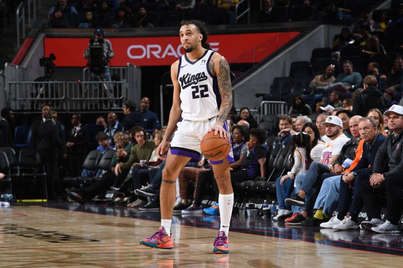 SAN FRANCISCO, CA - JANUARY 5:  Devin Carter #22 of the Sacramento Kings handles the ball during the game against the Golden State Warriors on January 5, 2025 at Chase Center in San Francisco, California. NOTE TO USER: User expressly acknowledges and agrees that, by downloading and or using this photograph, user is consenting to the terms and conditions of Getty Images License Agreement. Mandatory Copyright Notice: Copyright 2025 NBAE (Photo by Noah Graham/NBAE via Getty Images)