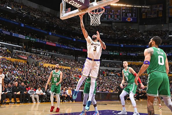 LOS ANGELES, CA - DECEMBER 25: Anthony Davis #3 of the Los Angeles Lakers drives to the basket during the game against the Boston Celtics on December 25, 2023 at Crypto.Com Arena in Los Angeles, California. NOTE TO USER: User expressly acknowledges and agrees that, by downloading and/or using this Photograph, user is consenting to the terms and conditions of the Getty Images License Agreement. Mandatory Copyright Notice: Copyright 2023 NBAE (Photo by Andrew D. Bernstein/NBAE via Getty Images)