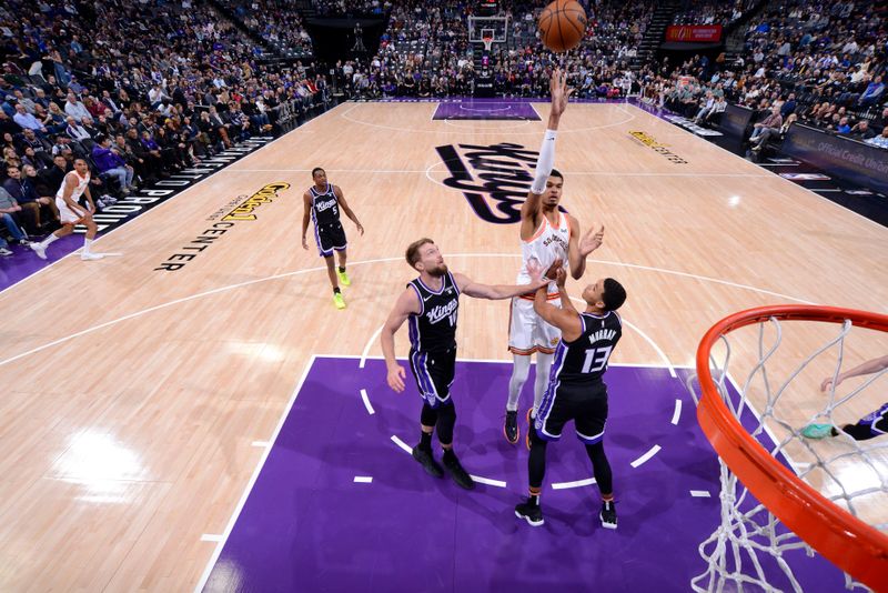 SACRAMENTO, CA - FEBRUARY 22: Victor Wembanyama #1 of the San Antonio Spurs shoots the ball during the game against the Sacramento Kings on February 22, 2024 at Golden 1 Center in Sacramento, California. NOTE TO USER: User expressly acknowledges and agrees that, by downloading and or using this Photograph, user is consenting to the terms and conditions of the Getty Images License Agreement. Mandatory Copyright Notice: Copyright 2023 NBAE (Photo by Rocky Widner/NBAE via Getty Images)