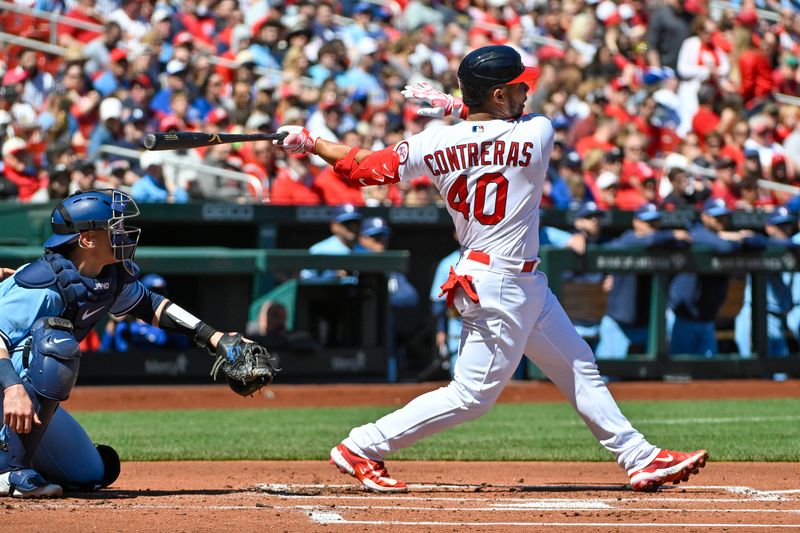 Apr 2, 2023; St. Louis, Missouri, USA;  St. Louis Cardinals catcher Willson Contreras (40) hits a single against the Toronto Blue Jays during the first inning at Busch Stadium. Mandatory Credit: Jeff Curry-USA TODAY Sports