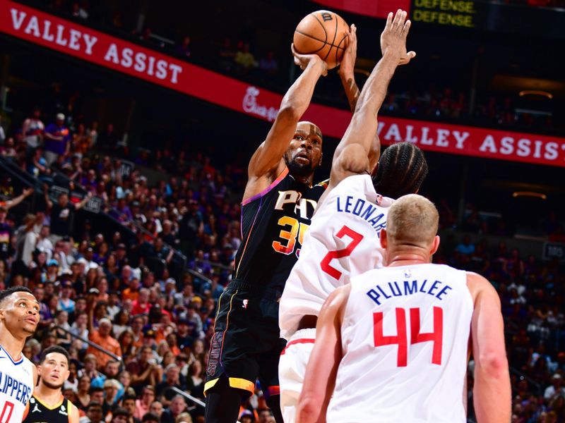 PHOENIX, AZ - APRIL 16:  Kevin Durant #35 of the Phoenix Suns goes to the basket during the game During round one game one of the 2023 NBA Playoffs on April 16, 2023 at Footprint Center in Phoenix, Arizona. NOTE TO USER: User expressly acknowledges and agrees that, by downloading and or using this photograph, user is consenting to the terms and conditions of the Getty Images License Agreement. Mandatory Copyright Notice: Copyright 2023 NBAE (Photo by Barry Gossage/NBAE via Getty Images)