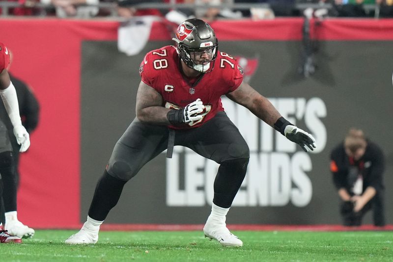 FILE - Tampa Bay Buccaneers offensive tackle Tristan Wirfs (78) prepares to make a block during an NFL wild-card playoff football game against the Philadelphia Eagles, Monday, Jan. 15, 2024 in Tampa, Fla. (AP Photo/Peter Joneleit, File)