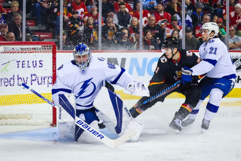 Jan 21, 2023; Calgary, Alberta, CAN; Tampa Bay Lightning goaltender Andrei Vasilevskiy (88) guards his net against the Calgary Flames during the second period at Scotiabank Saddledome. Mandatory Credit: Sergei Belski-USA TODAY Sports