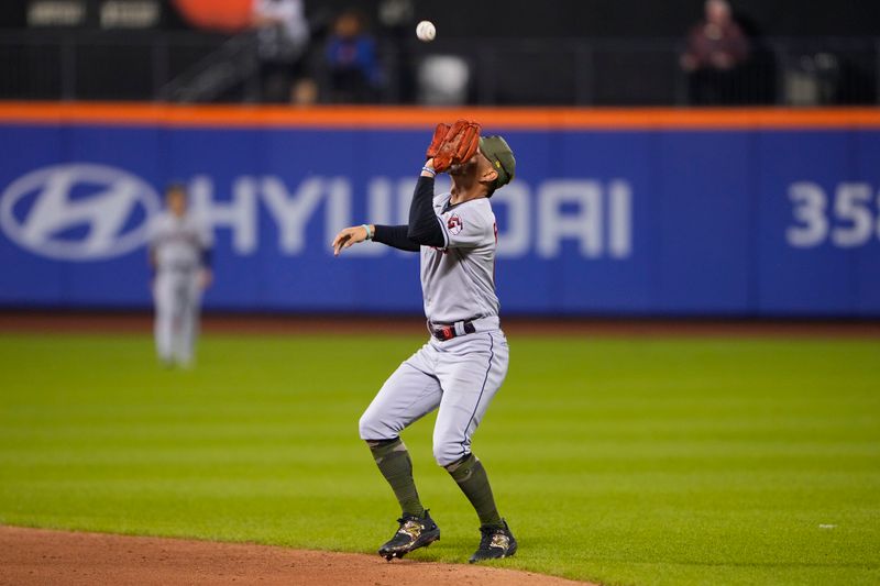 May 21, 2023; New York City, New York, USA; Cleveland Guardians second baseman Andres Gimenez (0) catches a fly ball hit by New York Mets center fielder Brandon Nimmo (9) (not pictured) during the eighth inning at Citi Field. Mandatory Credit: Gregory Fisher-USA TODAY Sports