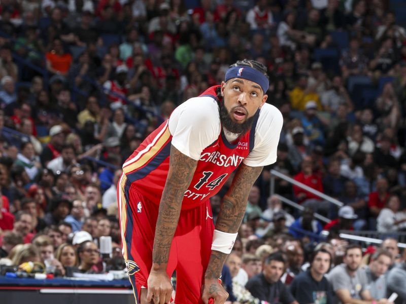 NEW ORLEANS, LA - OCTOBER 23: Brandon Ingram #14 of the New Orleans Pelicans looks on during the game on October 23, 2024 at the Smoothie King Center in New Orleans, Louisiana. NOTE TO USER: User expressly acknowledges and agrees that, by downloading and or using this Photograph, user is consenting to the terms and conditions of the Getty Images License Agreement. Mandatory Copyright Notice: Copyright 2024 NBAE (Photo by Layne Murdoch Jr./NBAE via Getty Images)