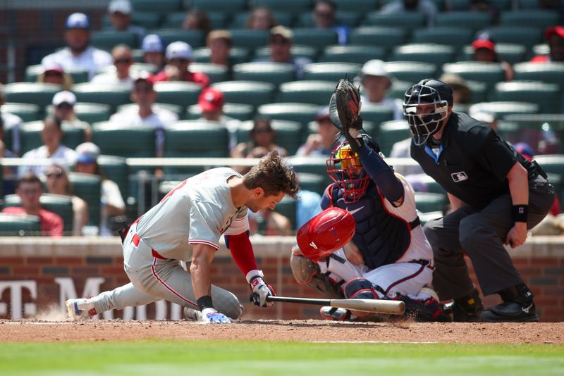 Jul 7, 2024; Atlanta, Georgia, USA; Philadelphia Phillies shortstop Trea Turner (7) is hit by a pitch against the Atlanta Braves in the eighth inning at Truist Park. Mandatory Credit: Brett Davis-USA TODAY Sports