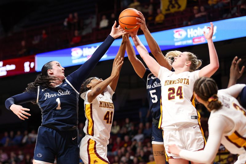 Jan 31, 2024; Minneapolis, Minnesota, USA; Penn State Nittany Lions forward Ali Brigham (1), guard Leilani Kapinus (5), Minnesota Golden Gophers forward Niamya Holloway (41) and forward Mallory Heyer (24) jump for the ball during the second half at Williams Arena. Mandatory Credit: Matt Krohn-USA TODAY Sports