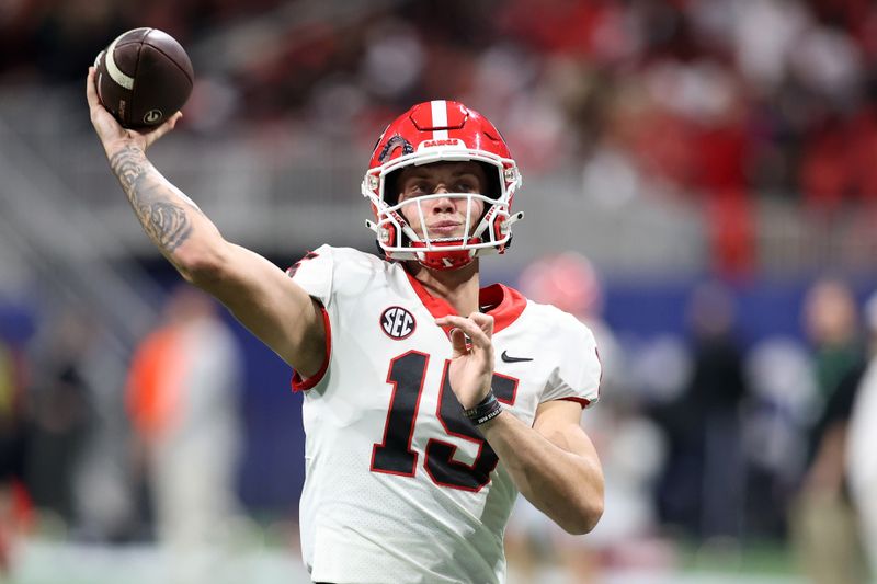 Dec 2, 2023; Atlanta, GA, USA; Georgia Bulldogs quarterback Carson Beck (15) practices before the SEC Football Championship against the Alabama Crimson Tide at Mercedes-Benz Stadium. Mandatory Credit: Brett Davis-USA TODAY Sports