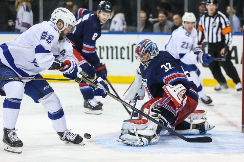 Feb 7, 2024; New York, New York, USA; New York Rangers goaltender Jonathan Quick (32) defends the net against Tampa Bay Lightning right wing Nikita Kucherov (86) in the first period at Madison Square Garden. Mandatory Credit: Wendell Cruz-USA TODAY Sports