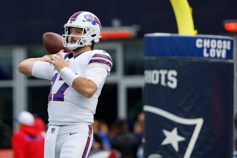 Buffalo Bills quarterback Josh Allen warms up prior to an NFL football game against the New England Patriots, Sunday, Oct. 22, 2023, in Foxborough, Mass. (AP Photo/Winslow Townson)