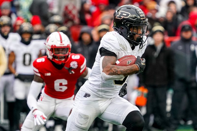 Oct 28, 2023; Lincoln, Nebraska, USA; Purdue Boilermakers running back Tyrone Tracy Jr. (3) runs against the Nebraska Cornhuskers during the second quarter at Memorial Stadium. Mandatory Credit: Dylan Widger-USA TODAY Sports