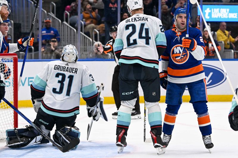 Feb 13, 2024; Elmont, New York, USA; New York Islanders center Kyle Palmieri (21) celebrates his goal against the Seattle Kraken during the second period at UBS Arena. Mandatory Credit: Dennis Schneidler-USA TODAY Sports