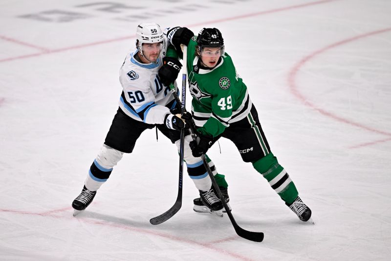 Mar 16, 2026; Dallas, Texas, USA; Utah Mammoth defenseman Sean Durzi (50) and Dallas Stars center Justin Hryckowian (49) battle for position during the first period at the American Airlines Center. Mandatory Credit: Jerome Miron-Imagn Images