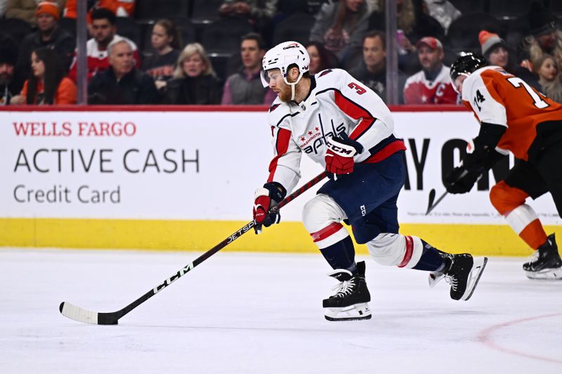 Dec 14, 2023; Philadelphia, Pennsylvania, USA; Washington Capitals defenseman Nick Jensen (3) controls the puck against the Philadelphia Flyers in the first period at Wells Fargo Center. Mandatory Credit: Kyle Ross-USA TODAY Sports