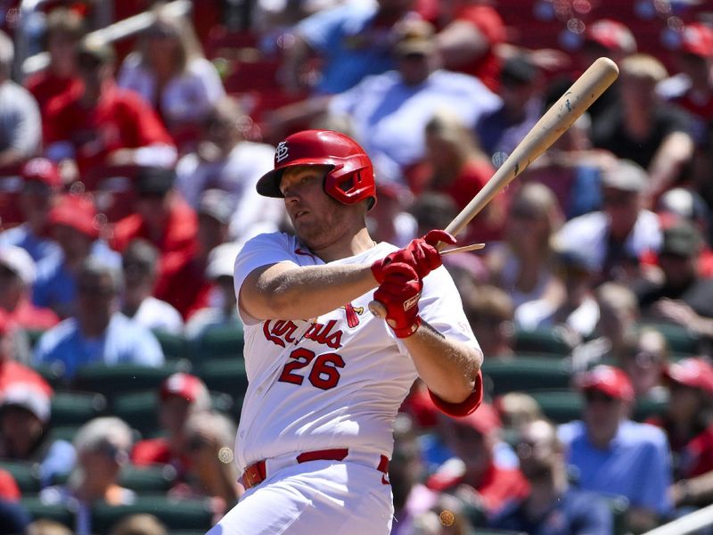 May 7, 2025; St. Louis, Missouri, USA;  St. Louis Cardinals pinch hitter Luken Baker (26) hits a double against the Pittsburgh Pirates during the eighth inning at Busch Stadium. Mandatory Credit: Jeff Curry-Imagn Images