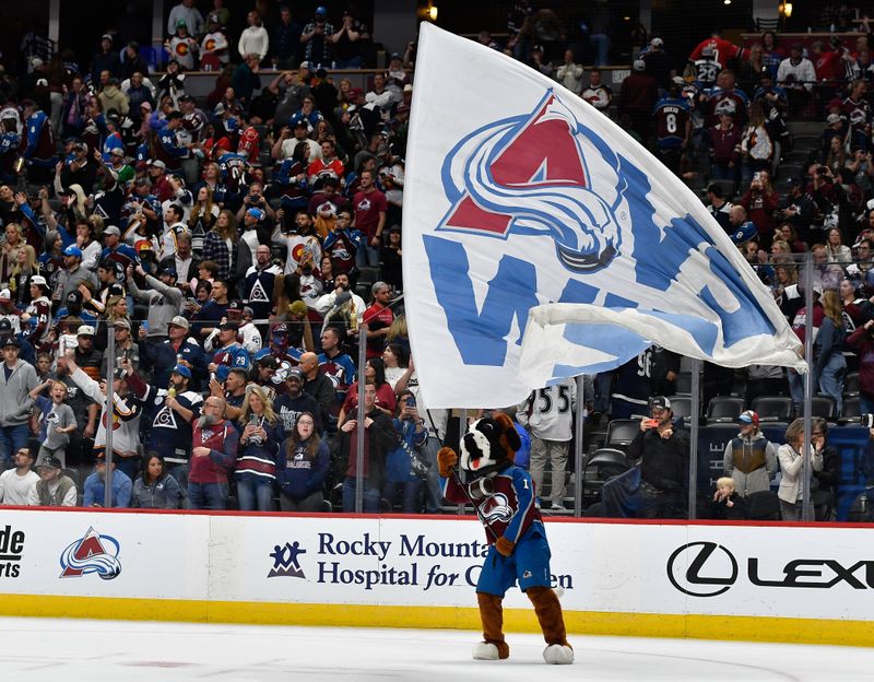 Oct 21, 2023; Denver, Colorado, USA; Colorado Avalanche mascot Bernie waves the We Win flag after the Colorado Avalanche defeat the Carolina Hurricanes at Ball Arena. Mandatory Credit: John Leyba-USA TODAY Sports