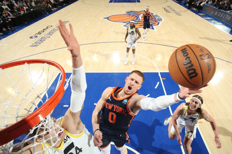 NEW YORK, NY - JANUARY 30: Donte Divincenzo #0 of the New York Knicks drives to the basket during the game against the Utah Jazz on January 30, 2024 at Madison Square Garden in New York City, New York.  NOTE TO USER: User expressly acknowledges and agrees that, by downloading and or using this photograph, User is consenting to the terms and conditions of the Getty Images License Agreement. Mandatory Copyright Notice: Copyright 2024 NBAE  (Photo by Nathaniel S. Butler/NBAE via Getty Images)