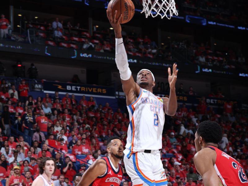 NEW ORLEANS, LA - APRIL 27: Shai Gilgeous-Alexander #2 of the Oklahoma City Thunder drives to the basket during the game against the New Orleans Pelicans during Round 1 Game 3 of the 2024 NBA Playoffs on April 27, 2024 at the Smoothie King Center in New Orleans, Louisiana. NOTE TO USER: User expressly acknowledges and agrees that, by downloading and or using this Photograph, user is consenting to the terms and conditions of the Getty Images License Agreement. Mandatory Copyright Notice: Copyright 2024 NBAE (Photo by Jeff Haynes/NBAE via Getty Images)