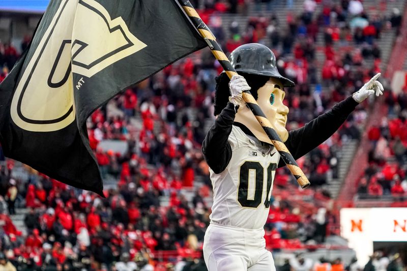 Oct 28, 2023; Lincoln, Nebraska, USA; Purdue Pete celebrates after a touchdown by the Purdue Boilermakers against the Nebraska Cornhuskers during the fourth quarter at Memorial Stadium. Mandatory Credit: Dylan Widger-USA TODAY Sports