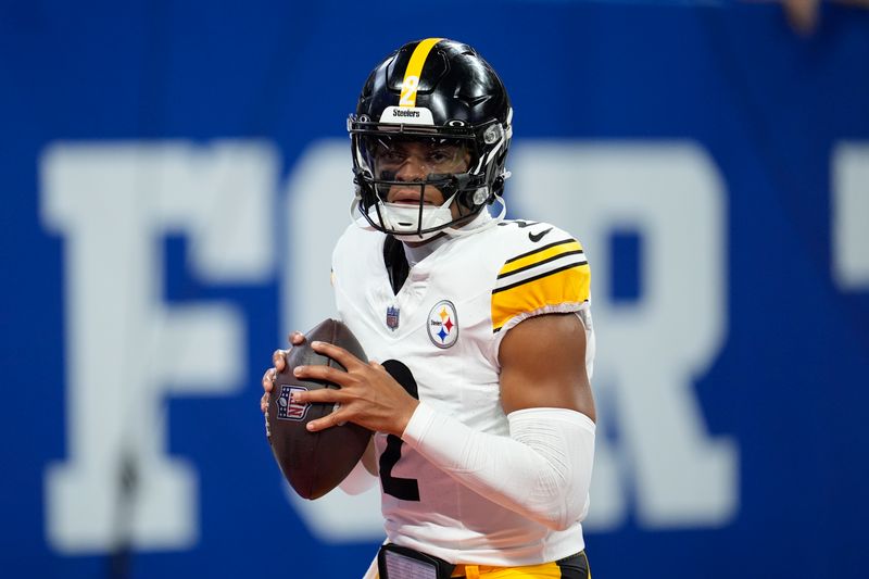 Pittsburgh Steelers quarterback Justin Fields (2) warms up before an NFL football game against the Indianapolis Colts Sunday, Sept. 29, 2024, in Indianapolis. (AP Photo/Michael Conroy)