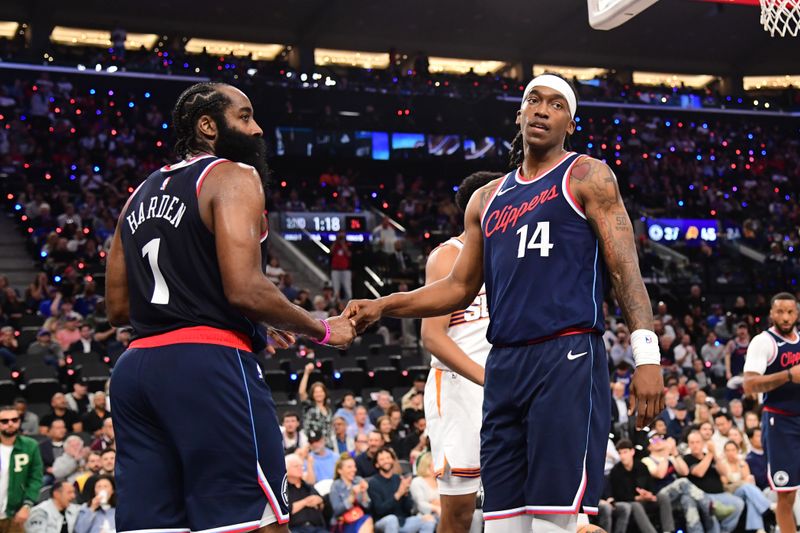 INGLEWOOD, CA - OCTOBER 23: James Harden #1 and Terance Mann #14 of the LA Clippers high five during the game against the Phoenix Suns on October 23, 2024 at Intuit Dome in Los Angeles, California. NOTE TO USER: User expressly acknowledges and agrees that, by downloading and/or using this Photograph, user is consenting to the terms and conditions of the Getty Images License Agreement. Mandatory Copyright Notice: Copyright 2024 NBAE (Photo by Adam Pantozzi/NBAE via Getty Images)