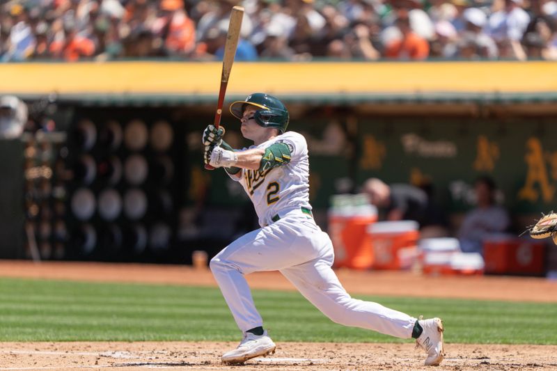 Aug 6, 2023; Oakland, California, USA;  Oakland Athletics shortstop Nick Allen (2) hits a two-run home run during the second inning against the San Francisco Giants at Oakland-Alameda County Coliseum. Mandatory Credit: Stan Szeto-USA TODAY Sports