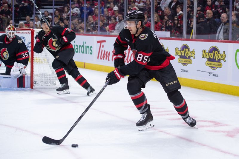 Oct 13, 2025; Ottawa, Ontario, CAN; Ottawa Senators defenseman Jake Sanderson (85) moves the puck in the second period against the Nashville Predators at the Canadian Tire Centre. Mandatory Credit: Marc DesRosiers-IMAGN Images