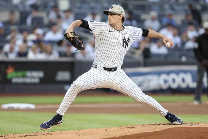 May 18, 2025; Bronx, New York, USA;  New York Yankees starting pitcher Max Fried (54) pitches in the first inning against the New York Mets at Yankee Stadium. Mandatory Credit: Wendell Cruz-Imagn Images