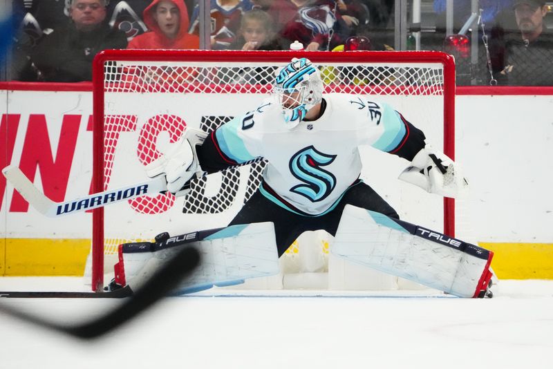 Oct 21, 2022; Denver, Colorado, USA; Seattle Kraken goaltender Martin Jones (30) makes a pad save in the third period against the Colorado Avalanche at Ball Arena. Mandatory Credit: Ron Chenoy-USA TODAY Sports